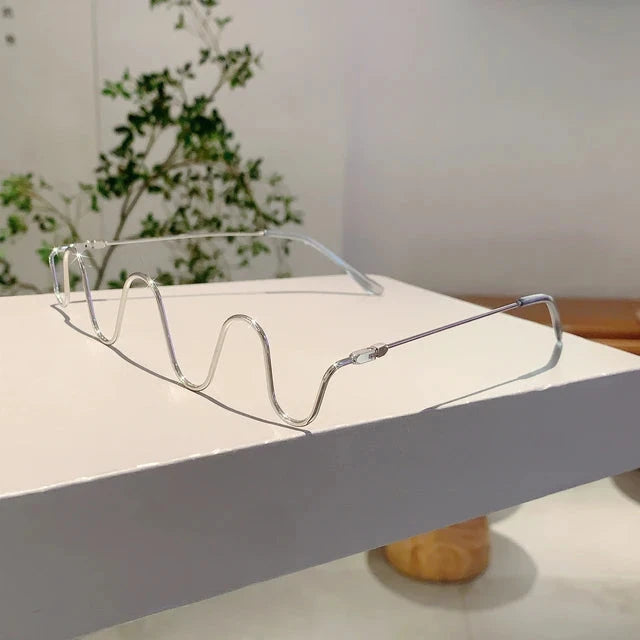 "Wavy" Rimless Fashion Frame Glasses Weekend Shade Sunglasses