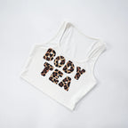 White tank top with leopard print text on a white background