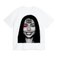 White t-shirt with a graphic of a woman's face and 'FREE THUG' text on a white background