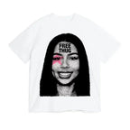 White t-shirt with a graphic of a woman's face and 'FREE THUG' text on a white background