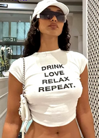 Drink, Love, Relax, Repeat Women’s Crop Top